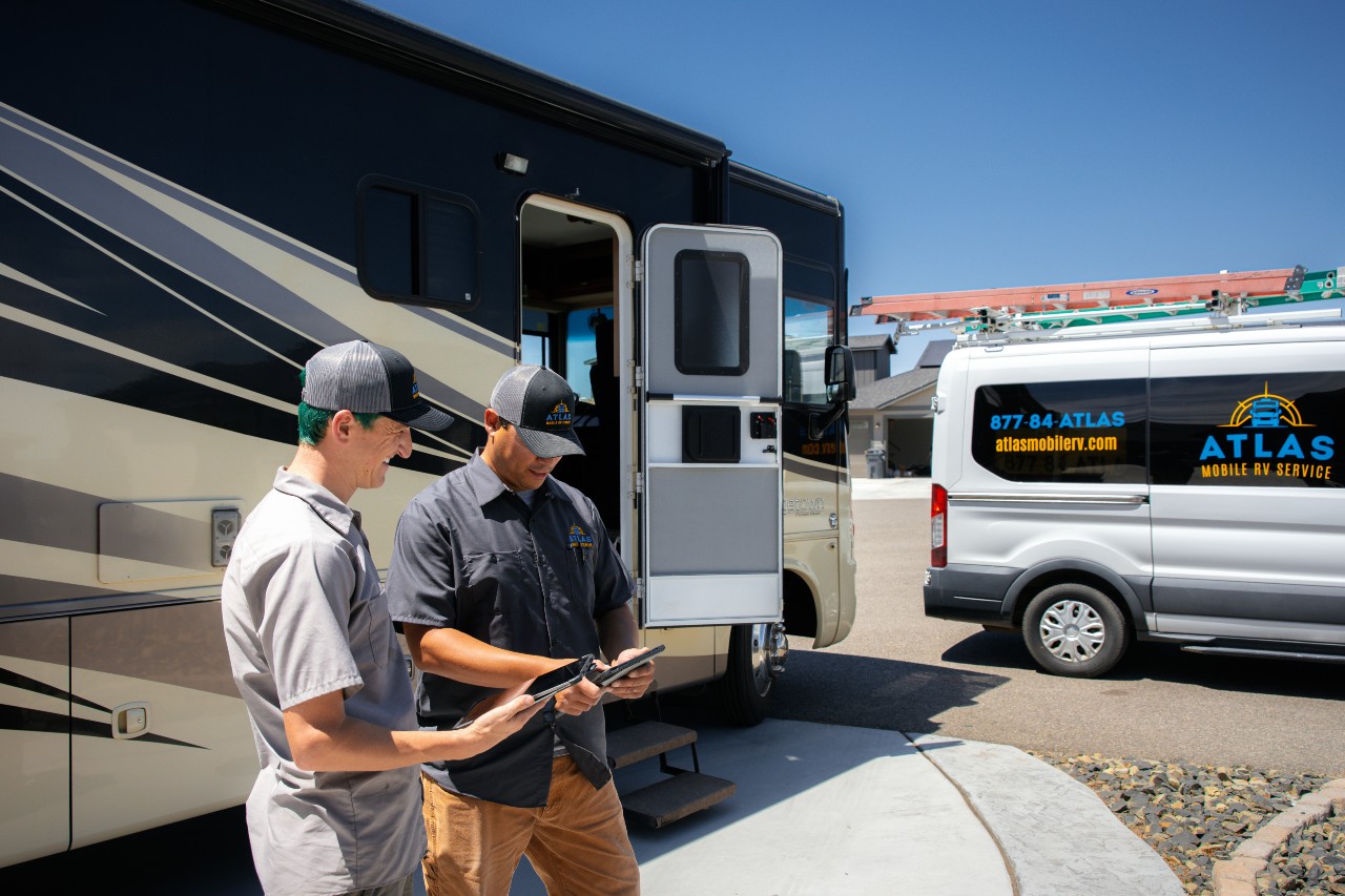 RV slide-out maintenance technicians